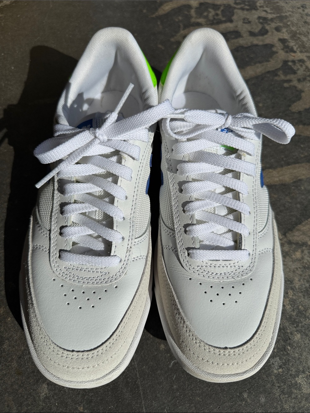 New Balance Men's White Leather Athletic Shoes with Blue & Green Accents
